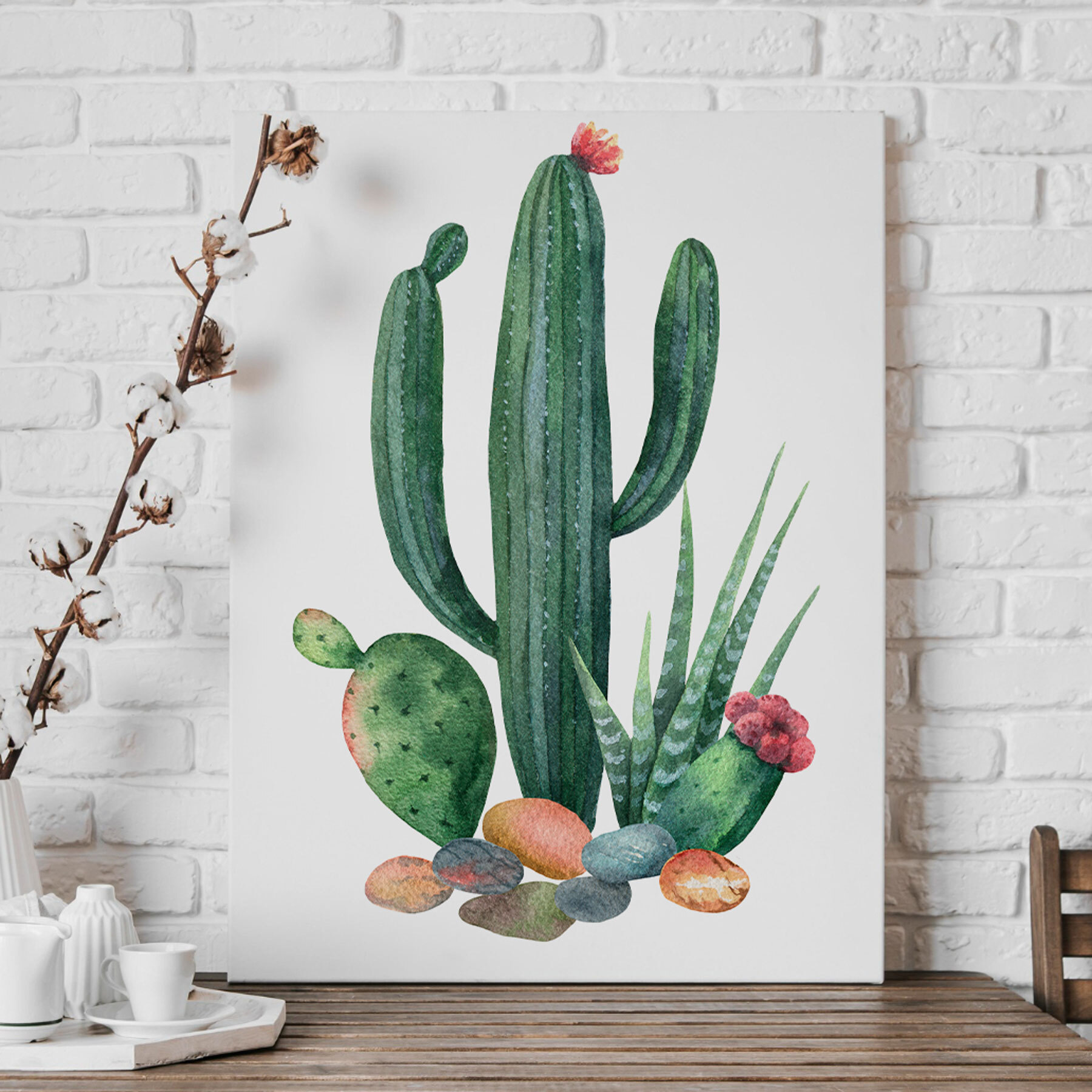 Watercolor of a cactus and rocks