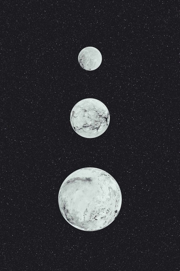 Group of white planets in a row