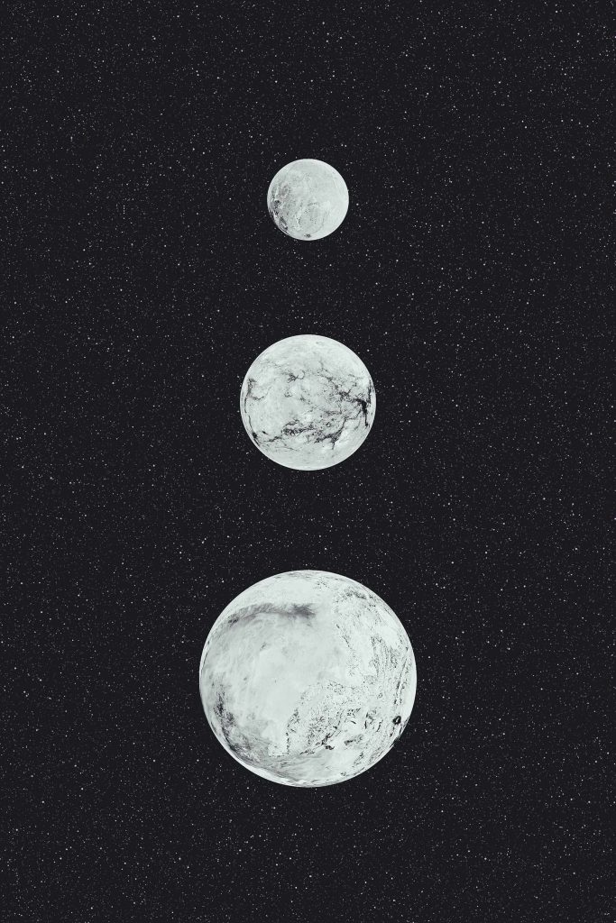Group of white planets in a row