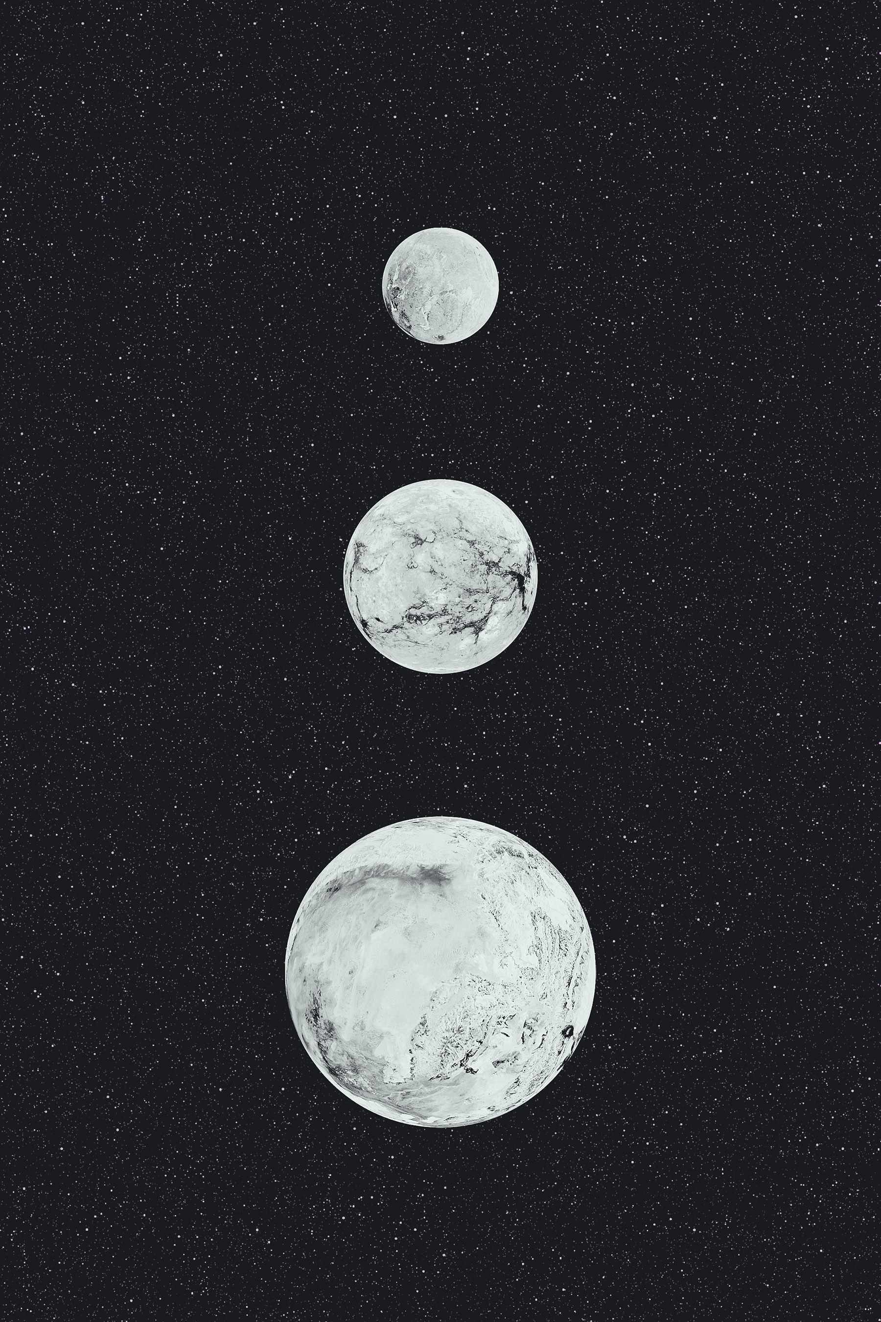 Group of white planets in a row