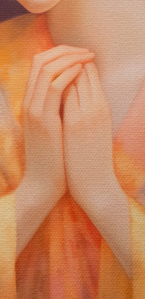 Woman in a robe with her hands together in front of a flowery background Woman in a robe with her hands together in front of a flowery background