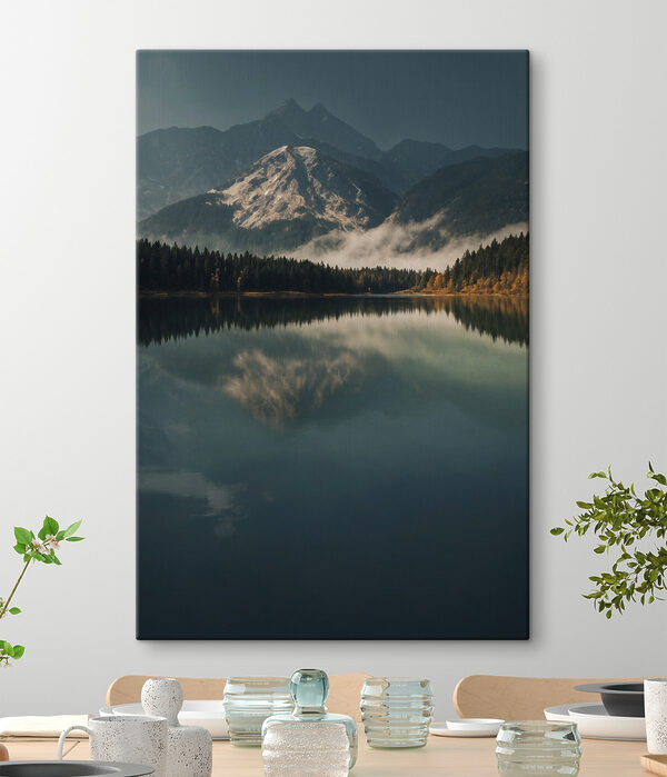 Lake with trees and mountains in the background Lake with trees and mountains in the background
