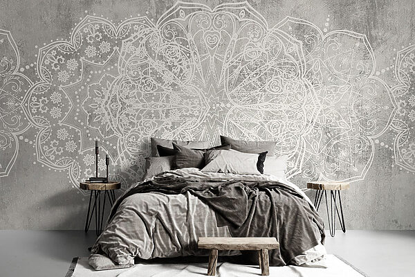 Disegno ornamentale bianco su superficie grigia Disegno ornamentale bianco su superficie grigia