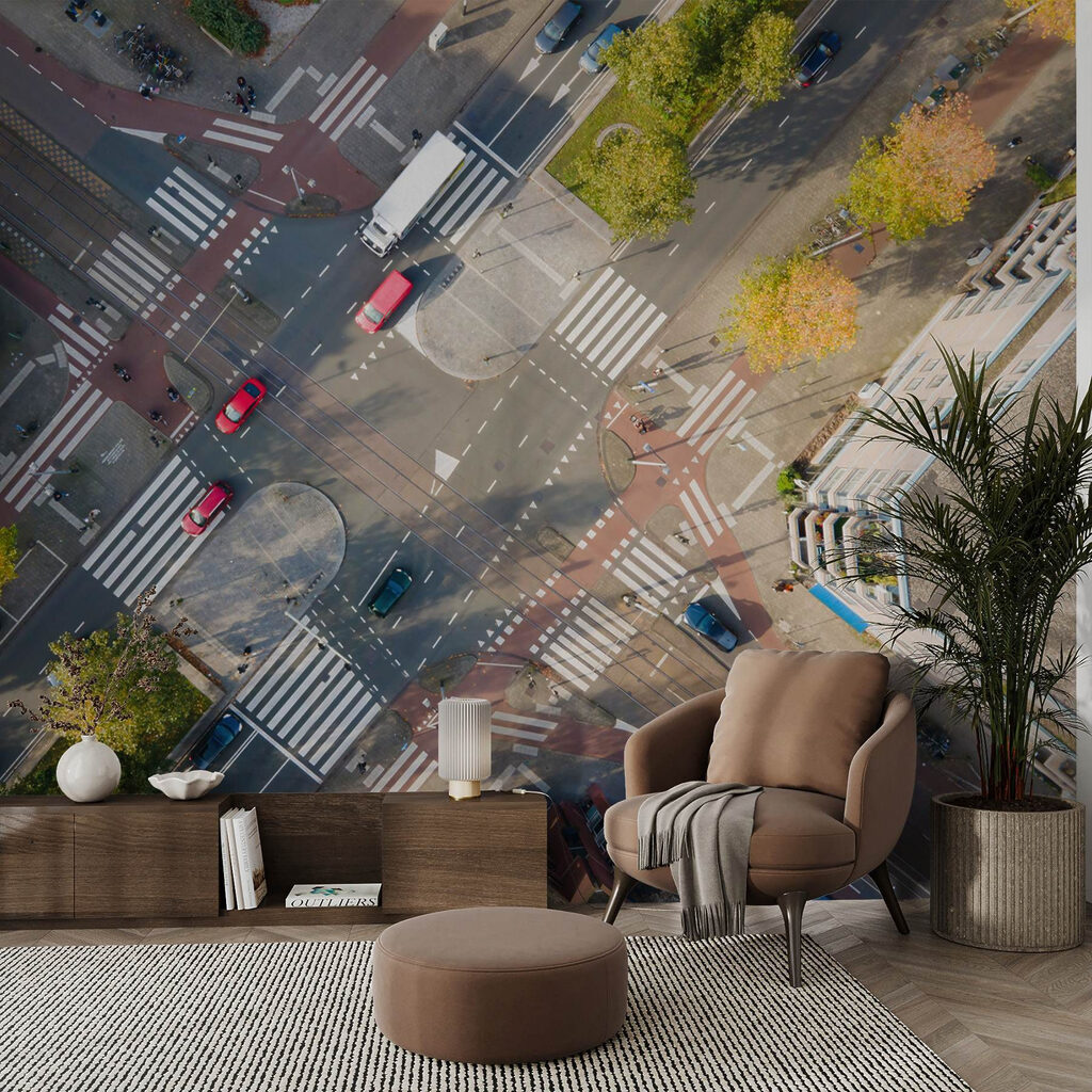 Aerial view of a street intersection with cars and buildings