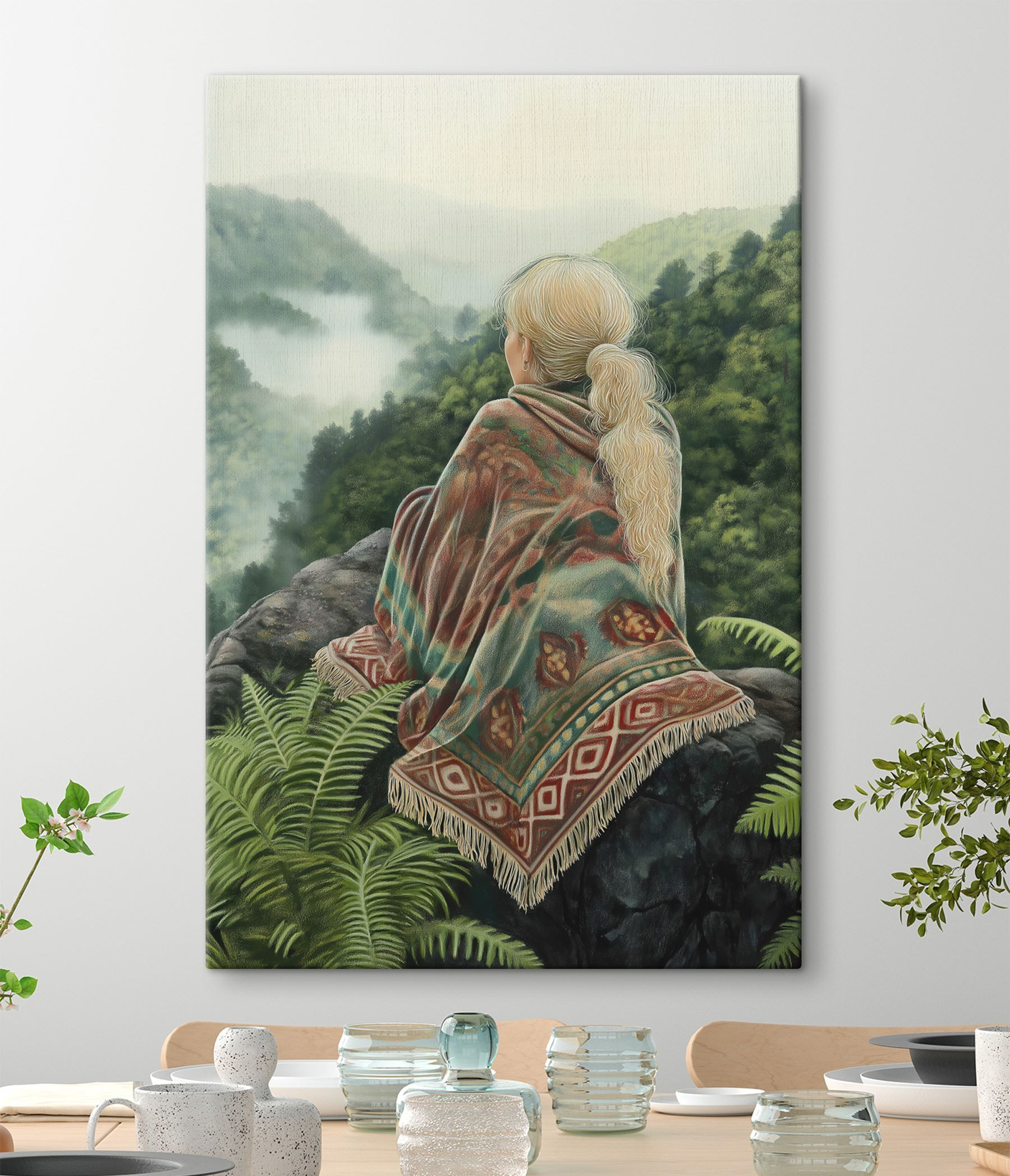 Woman sitting on a rock looking at a foggy valley Woman sitting on a rock looking at a foggy valley