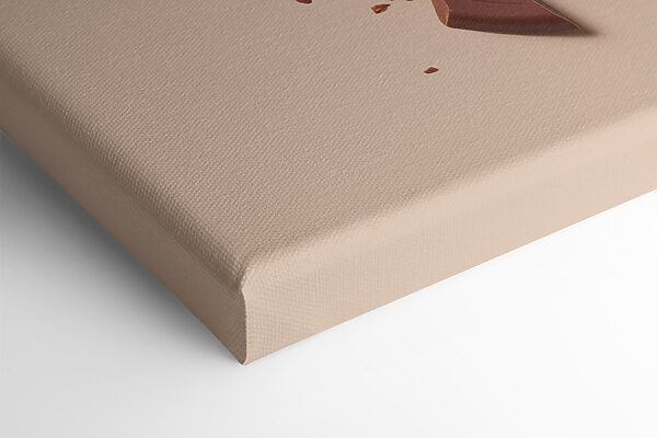 Broken chocolate bar on a pink surface Broken chocolate bar on a pink surface