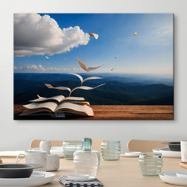Book with flying birds flying out of it