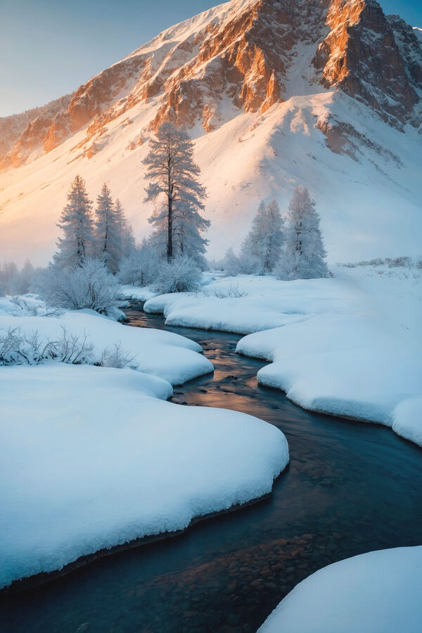 River running through a snowy mountain