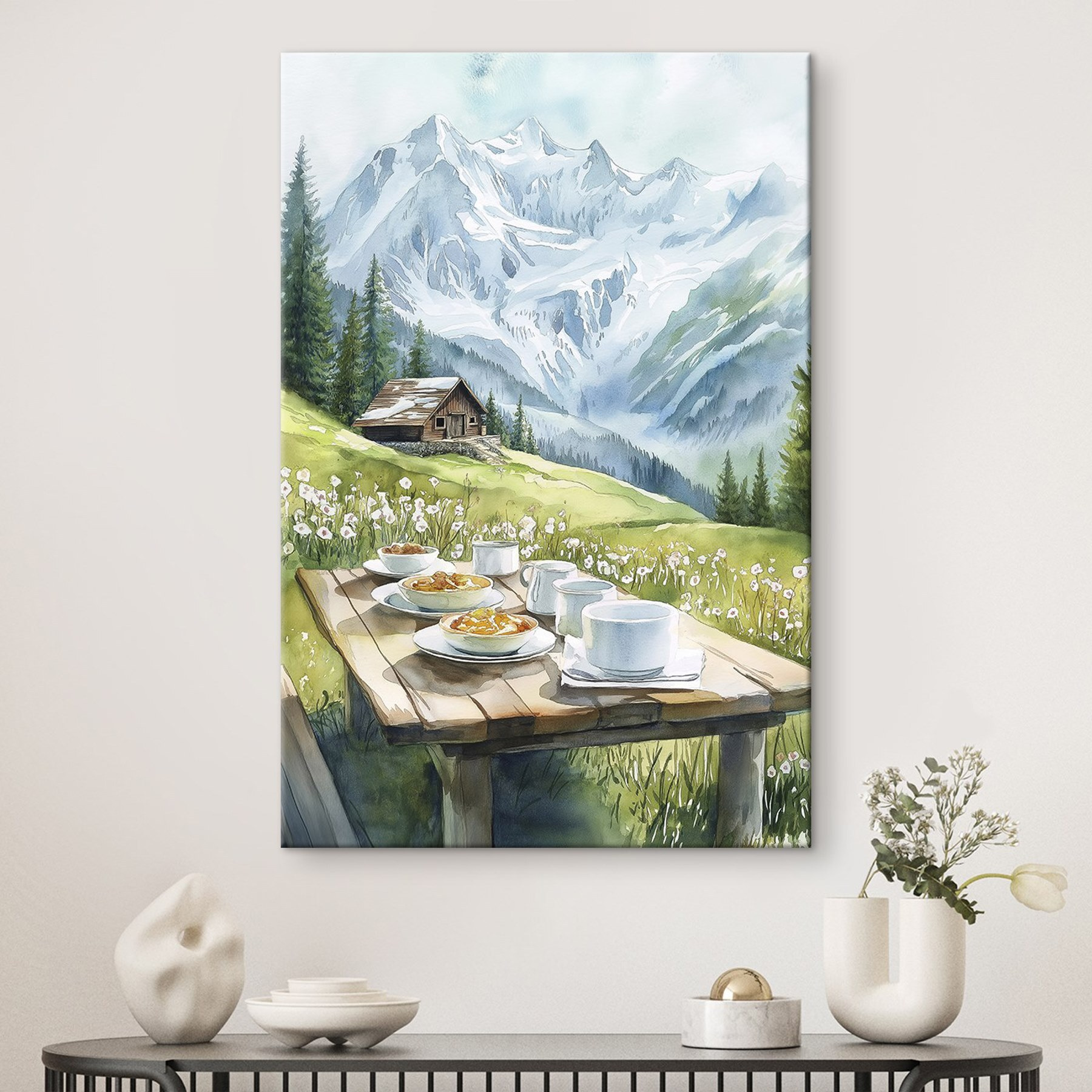 Table with plates of food and cups on it with mountains in the background Table with plates of food and cups on it with mountains in the background