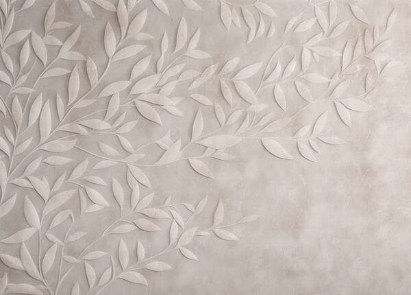 Disegno di foglie bianche su una parete Disegno di foglie bianche su una parete