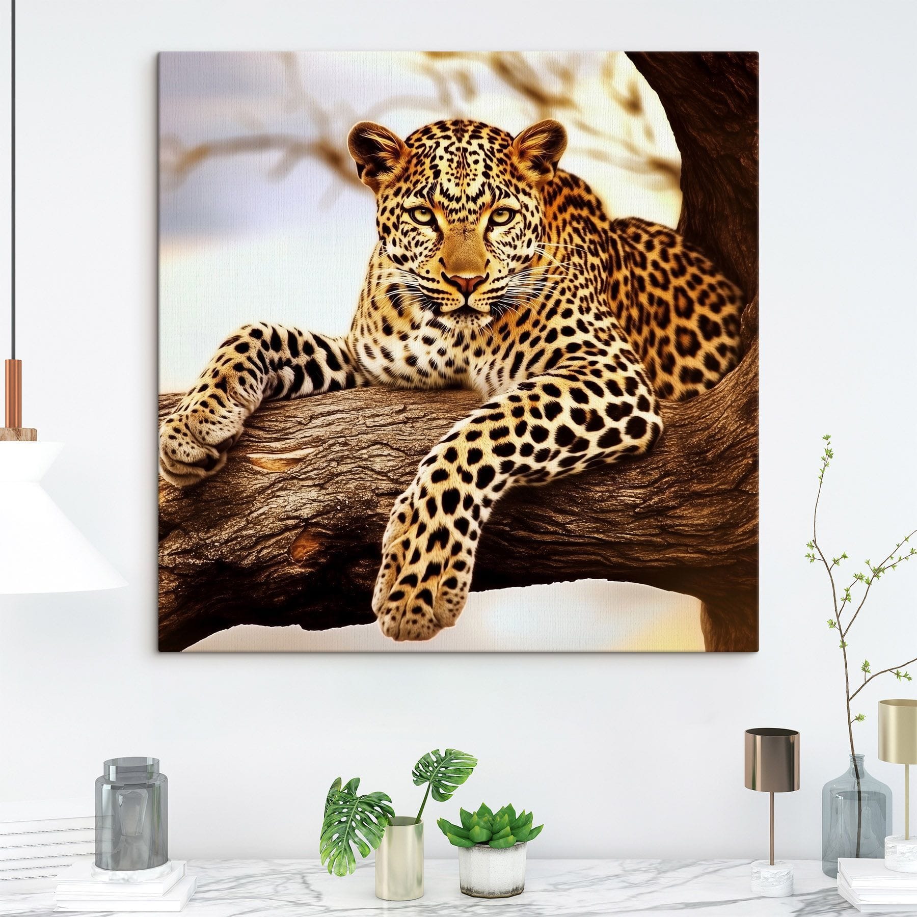 Leopard lying on a tree branch