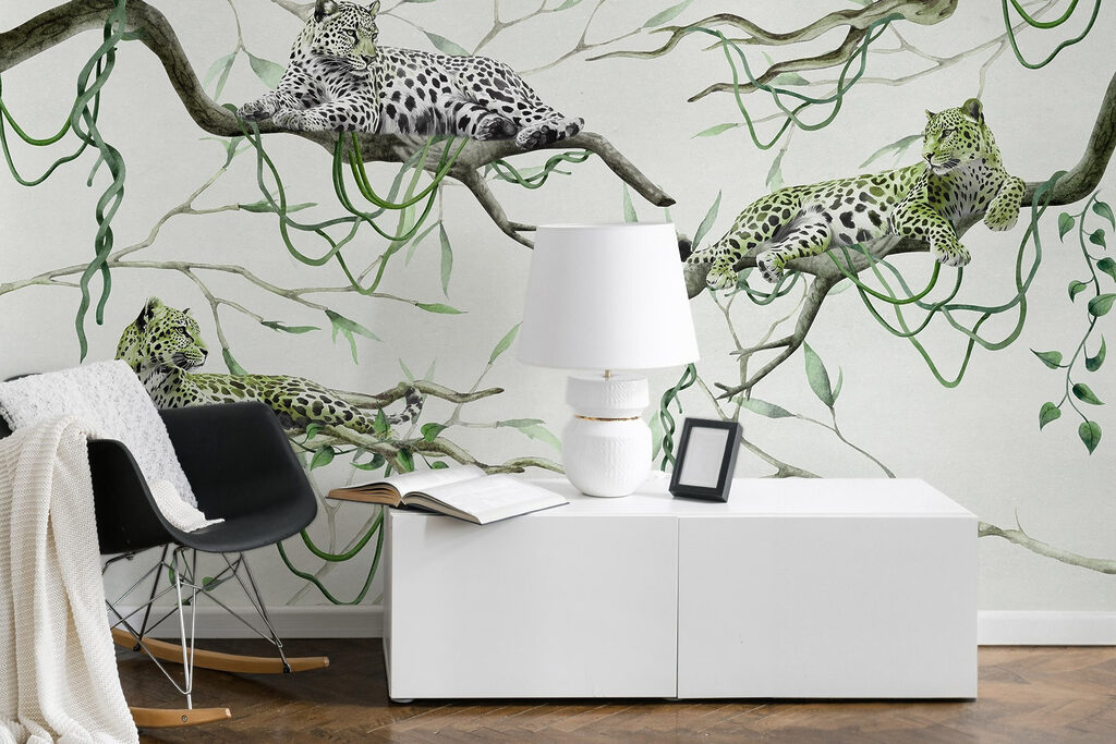 Group of leopards lying on branches