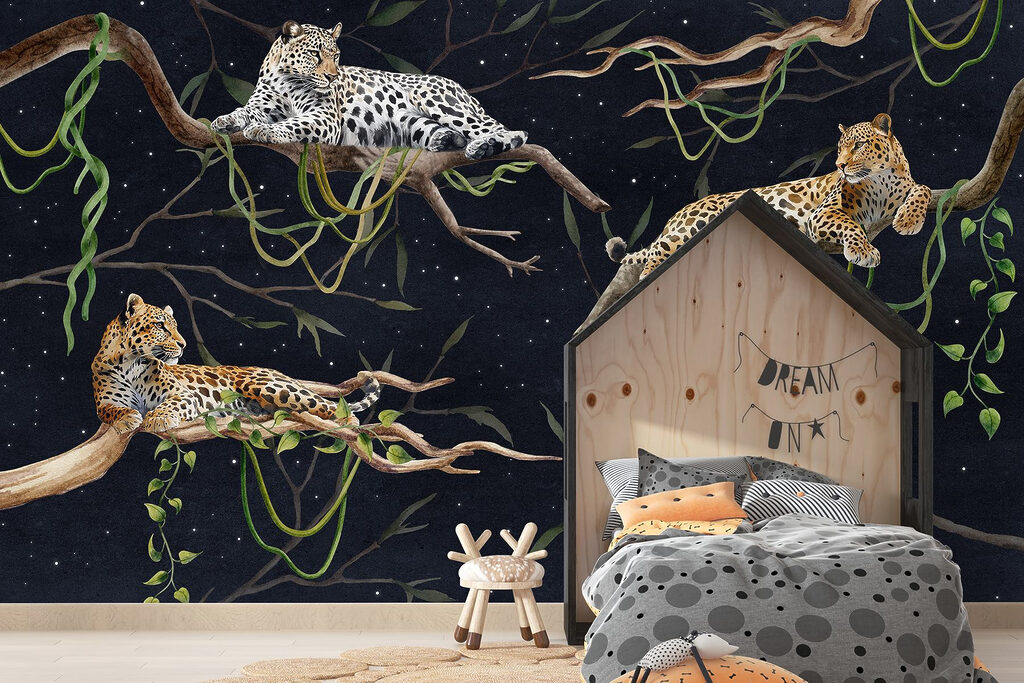 Group of leopards lying on branches