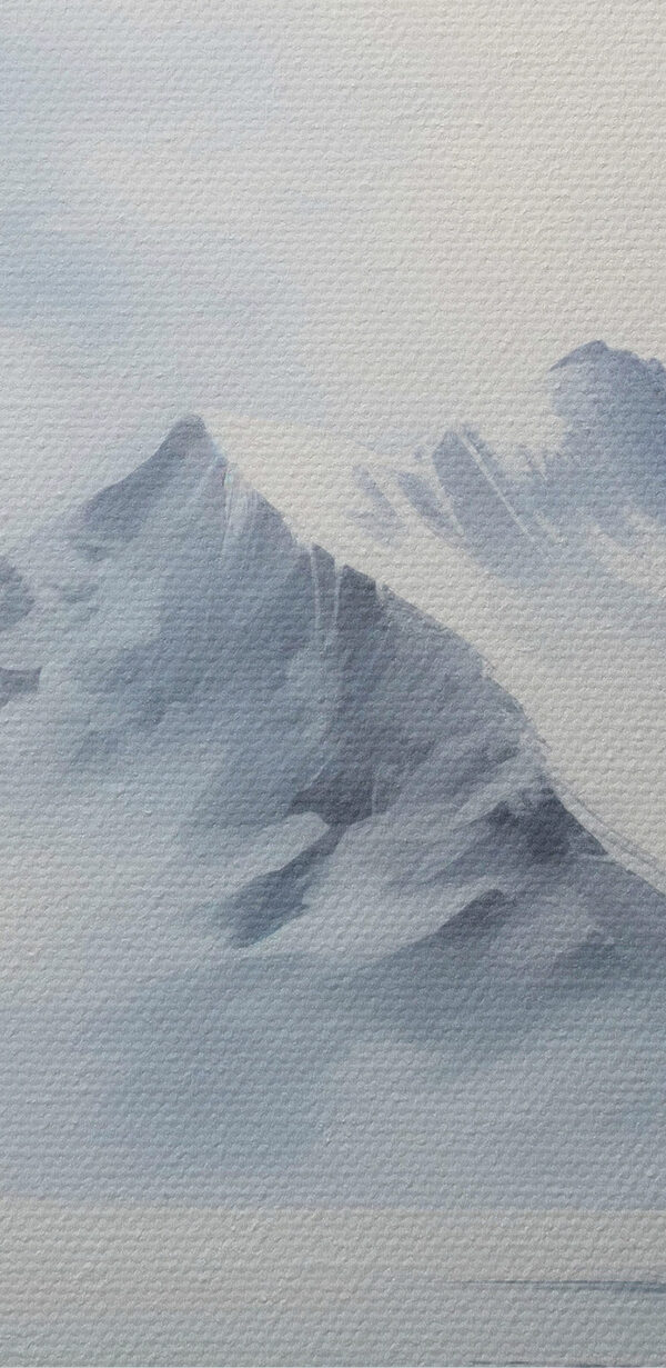 Snowy mountain range and a body of water Snowy mountain range and a body of water