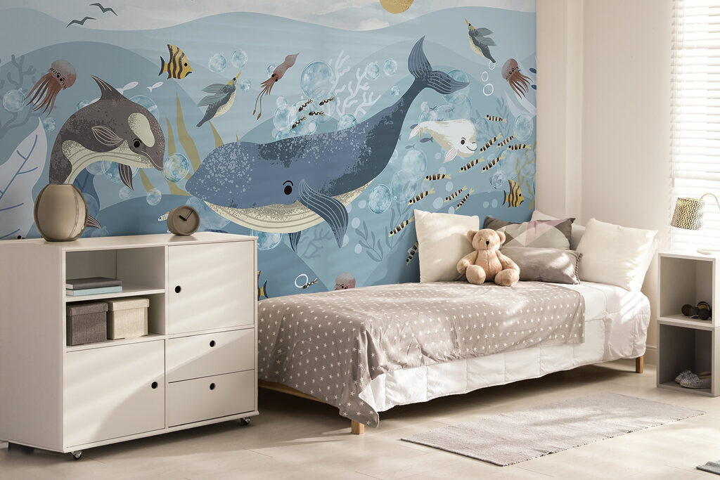 Group of fish and whales swimming in the ocean