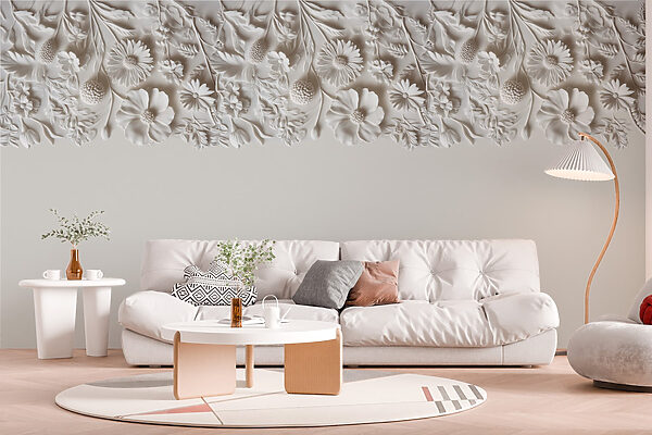 Disegno floreale bianco su una parete Disegno floreale bianco su una parete