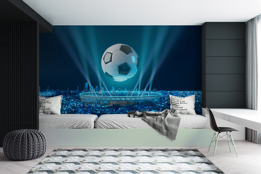 Pallone da calcio sopra uno stadio