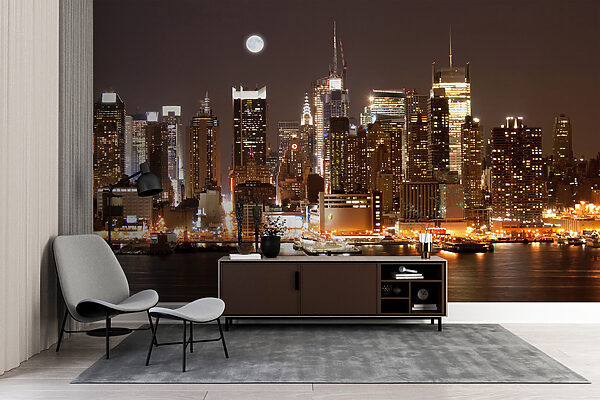 Lo skyline della città di notte con la luna in cielo Lo skyline della città di notte con la luna in cielo