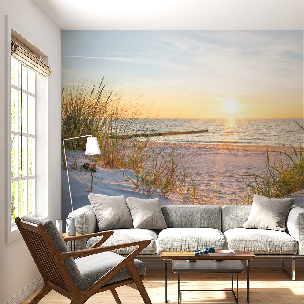 Beach with grass and a body of water