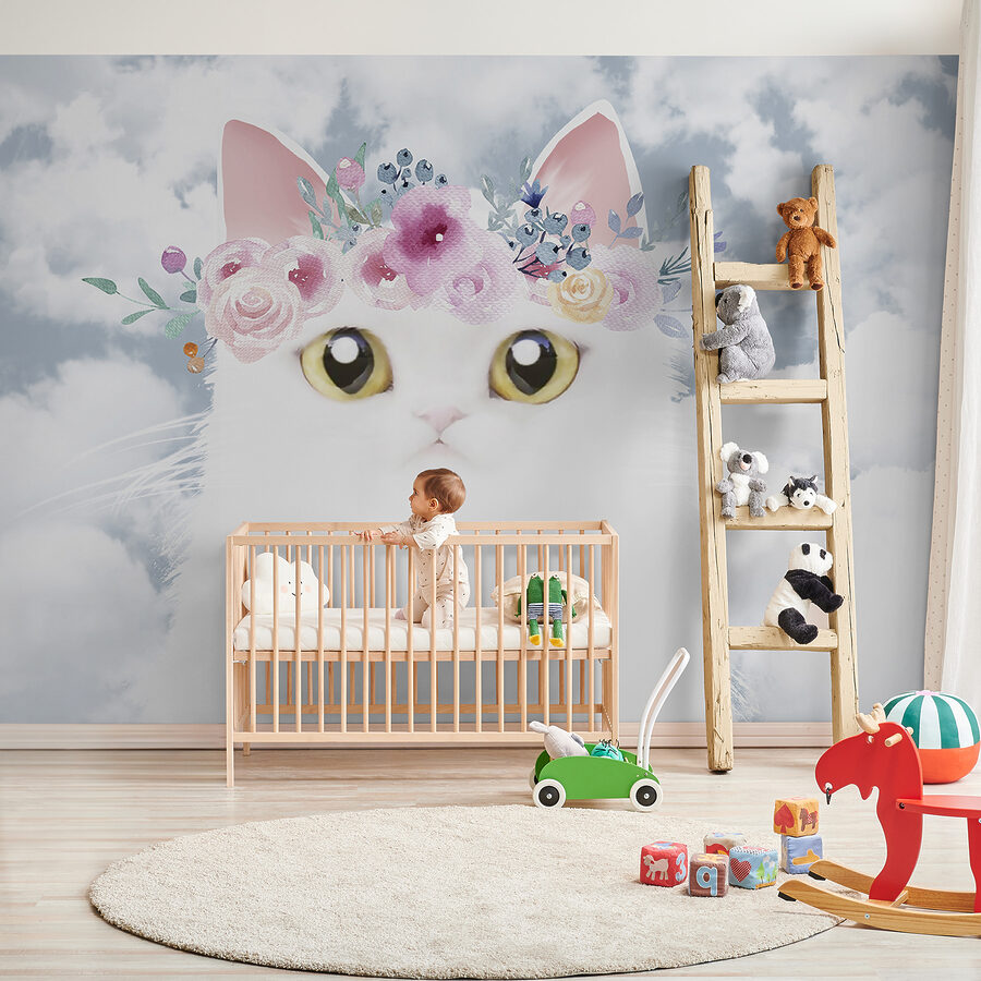 Gatto con fiori in testa