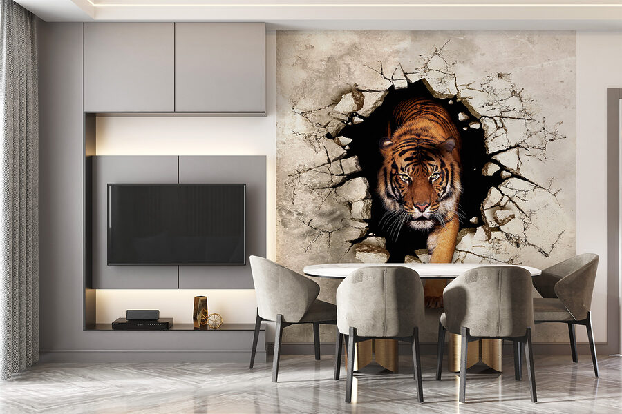 La tigre che esce da un buco nel muro