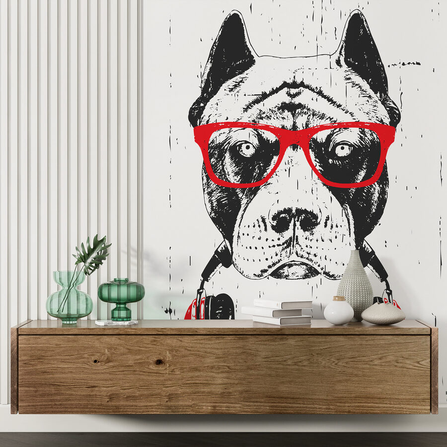Un cane con occhiali e cuffie Un cane con occhiali e cuffie