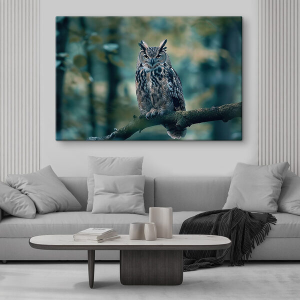 An owl sitting on a branch An owl sitting on a branch