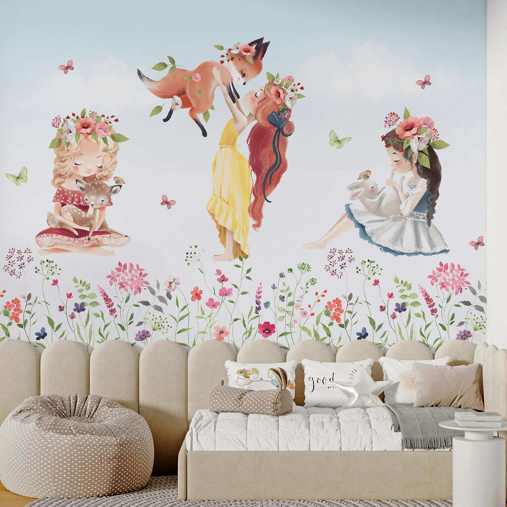 Group of girls holding animals in a field of flowers