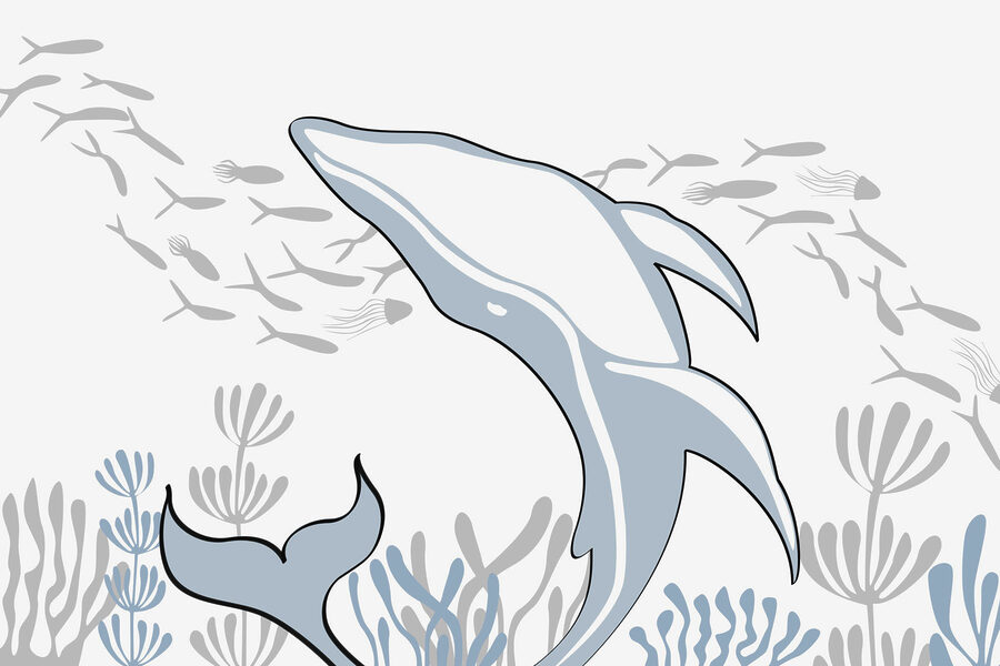 Delfino che nuota nell'oceano