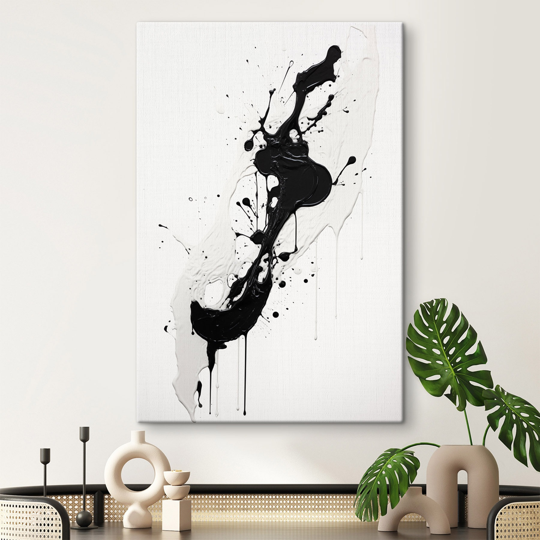 Black and white paint splattered on a white surface