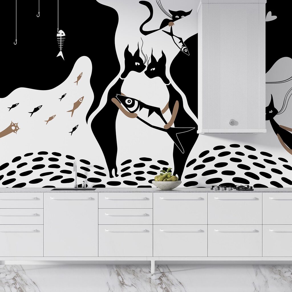 Gatto bianco e nero con pesce e pesce