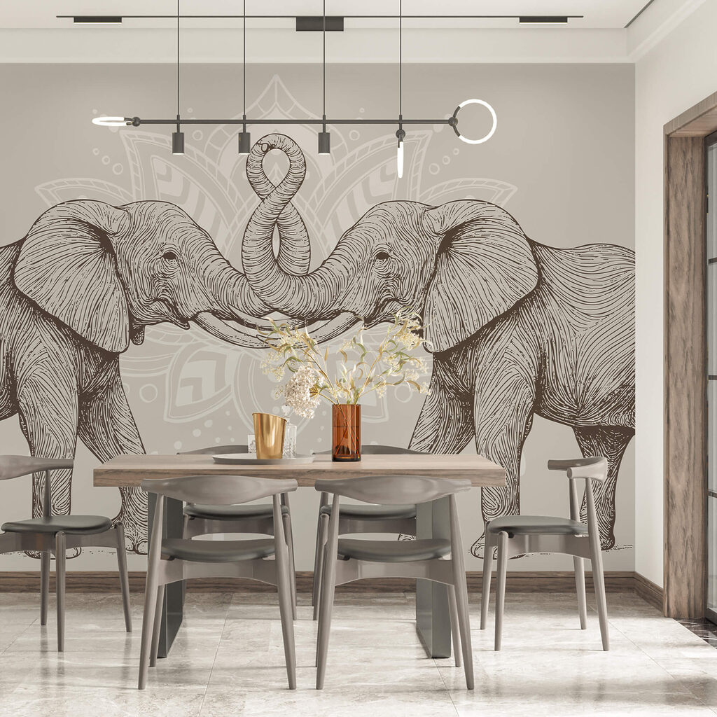 Due elefanti con la proboscide accartocciata