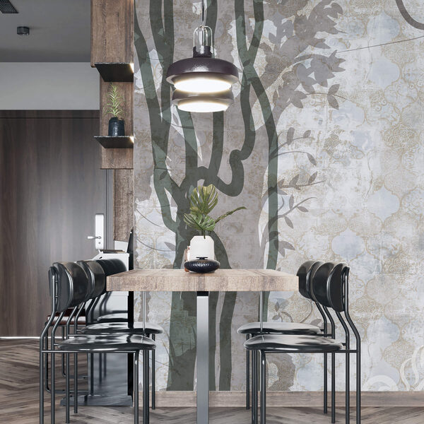 Parete bianca con viti e foglie