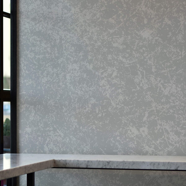 Superficie bianca maculata con piccoli puntini Superficie bianca maculata con piccoli puntini