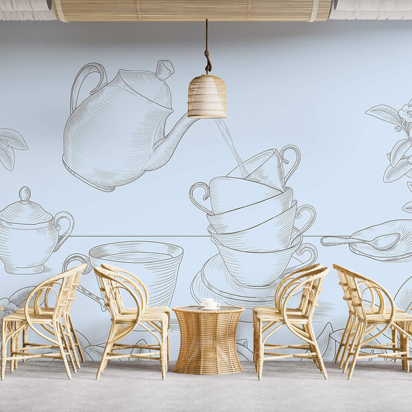 Teiera che versa il tè in una pila di tazze da tè Teiera che versa il tè in una pila di tazze da tè