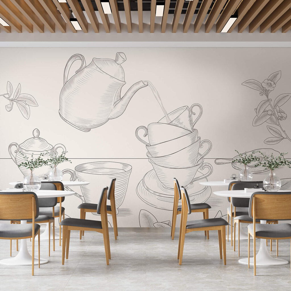 Teiera che versa il tè in una pila di tazze da tè