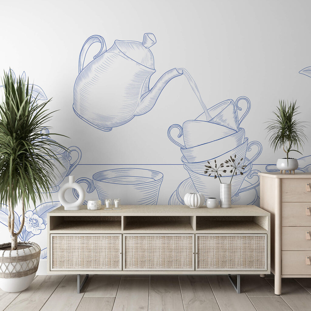 Teiera che versa il tè in una pila di tazze da tè Teiera che versa il tè in una pila di tazze da tè