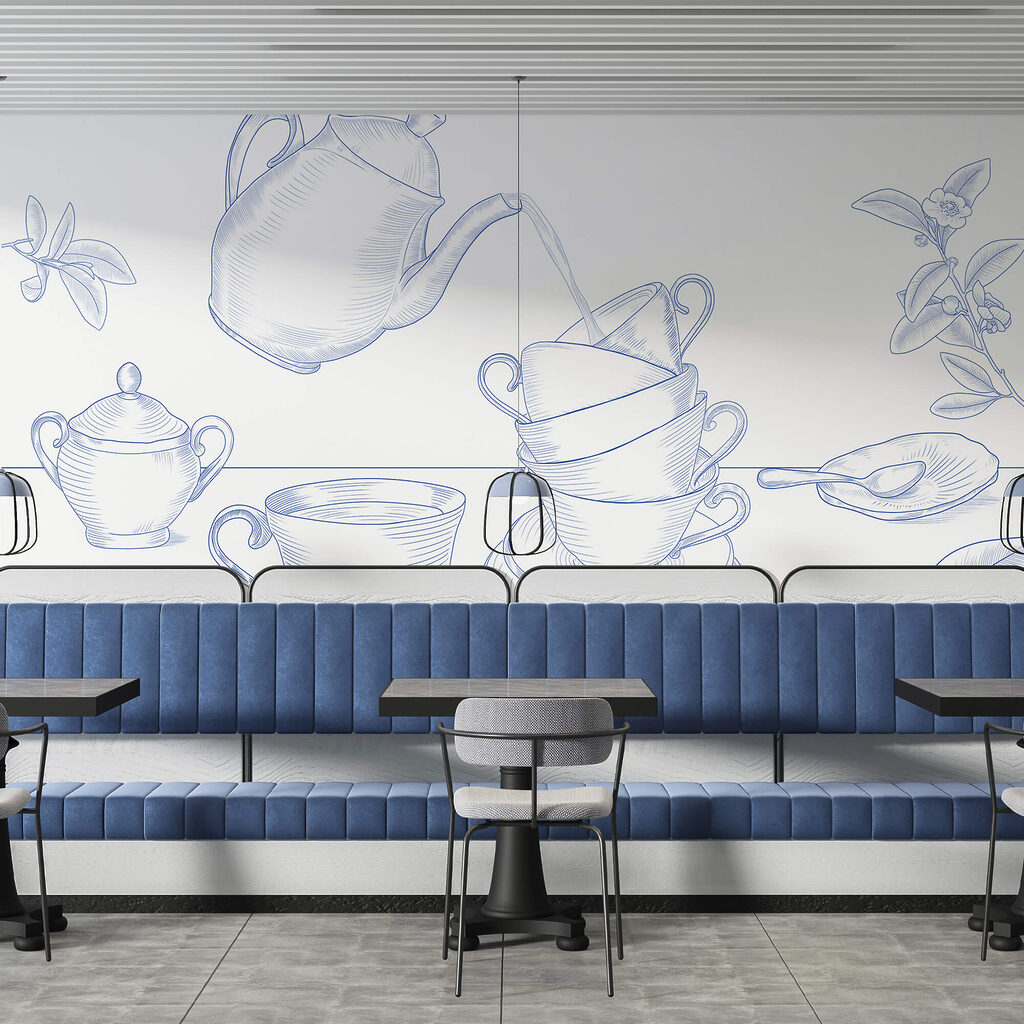 Teiera che versa il tè in una pila di tazze da tè Teiera che versa il tè in una pila di tazze da tè