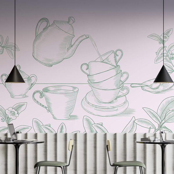 Teiera che versa il tè in una pila di tazze da tè