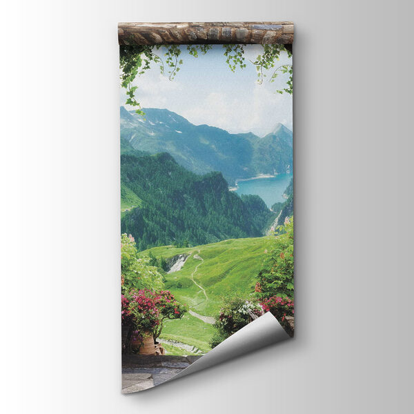 Stone archway with stone statues and a view of a valley and mountains Stone archway with stone statues and a view of a valley and mountains