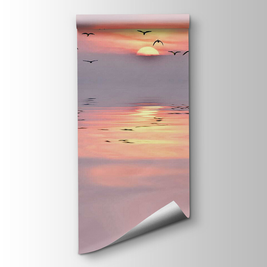 Flock of birds flying over water