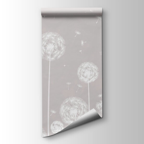 A white dandelions flying in the air A white dandelions flying in the air