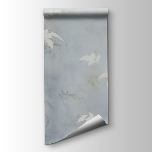 White leaves on a grey surface White leaves on a grey surface