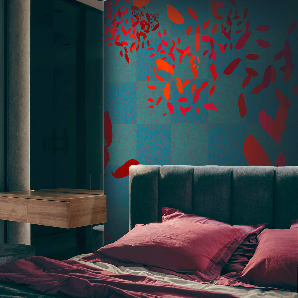 Foglie rosse su sfondo blu