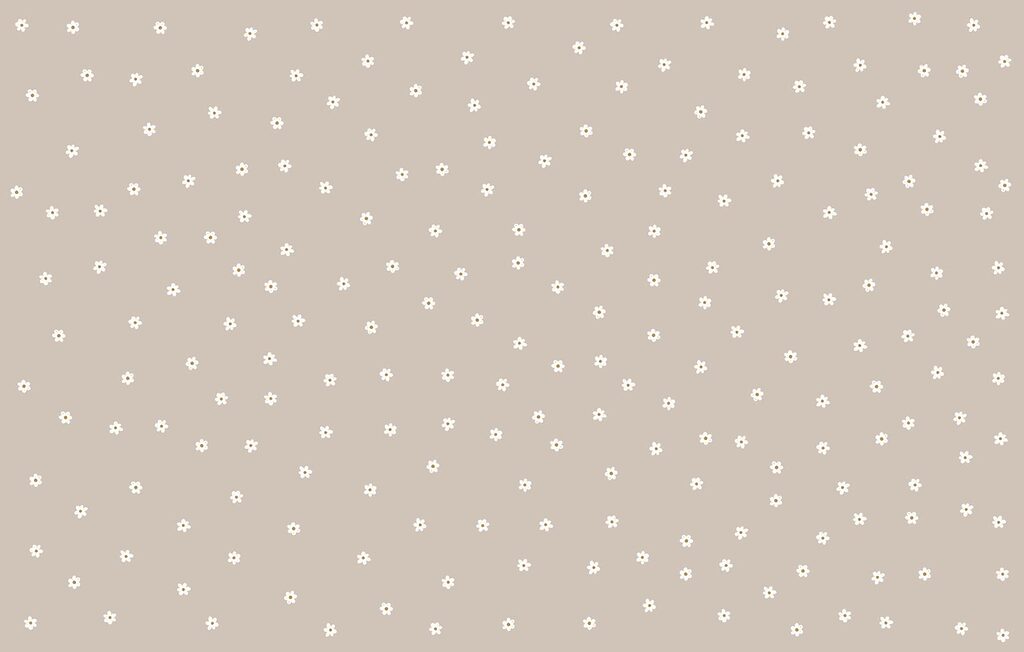 Pattern of small white flowers on a tan background