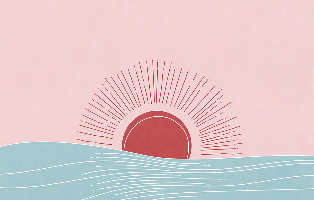 Sun rising over water
