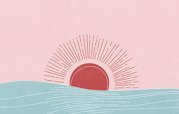 Sun rising over water