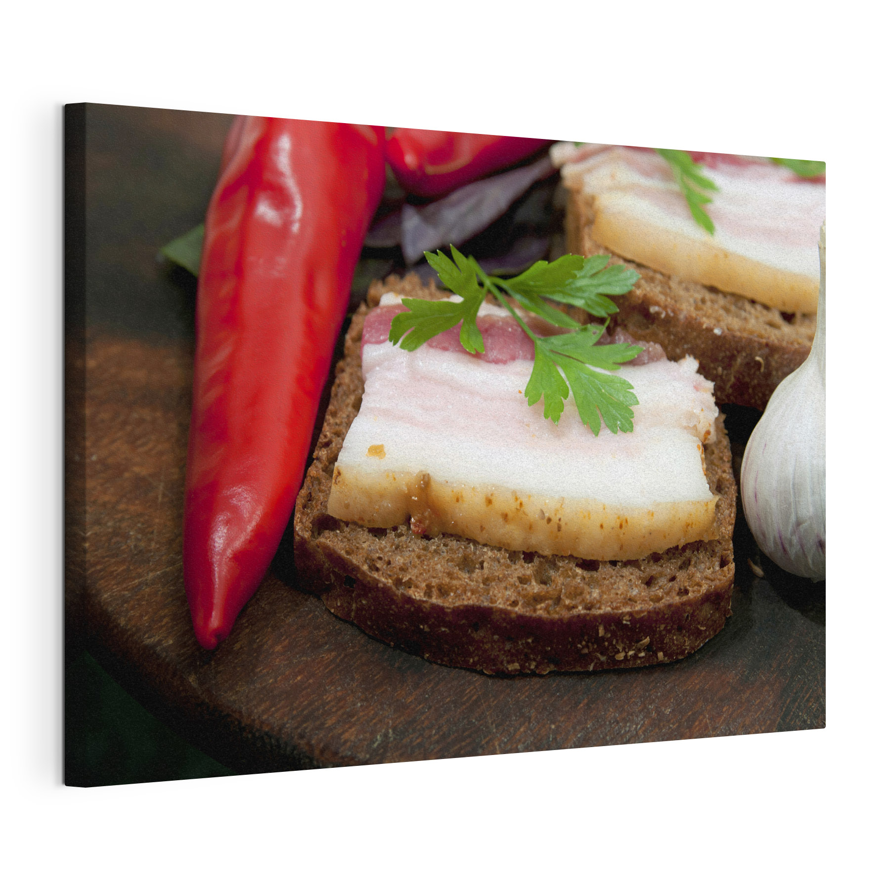 A piece of bread with bacon and parsley on top
