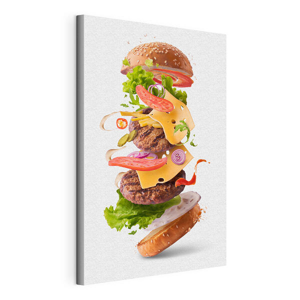Quadri Un hamburger con carne e verdure che volano in aria
