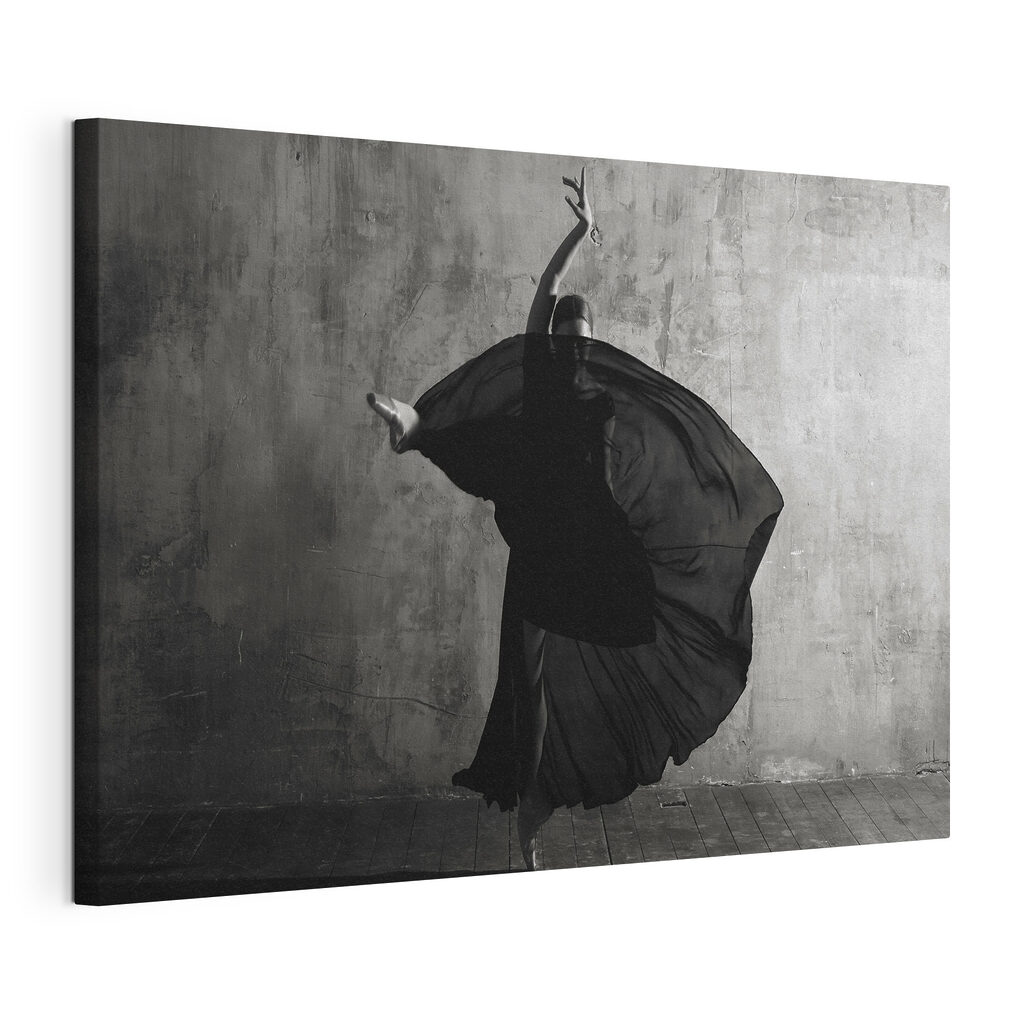 A woman dancing in a black dress A woman dancing in a black dress